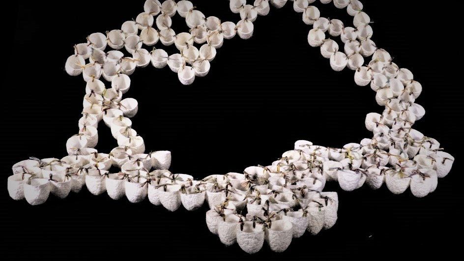 necklace made out of silk cacoons by caren shen